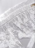 White lace skirt detail view